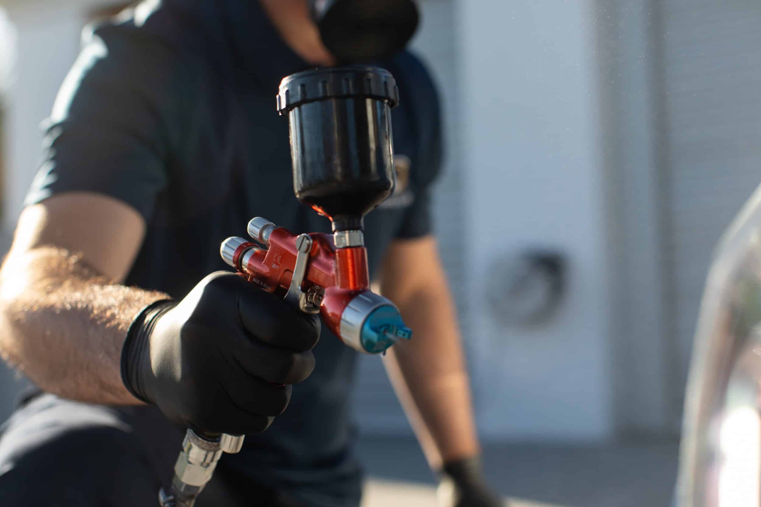 Image of our technician conducting dent repair in Sydney